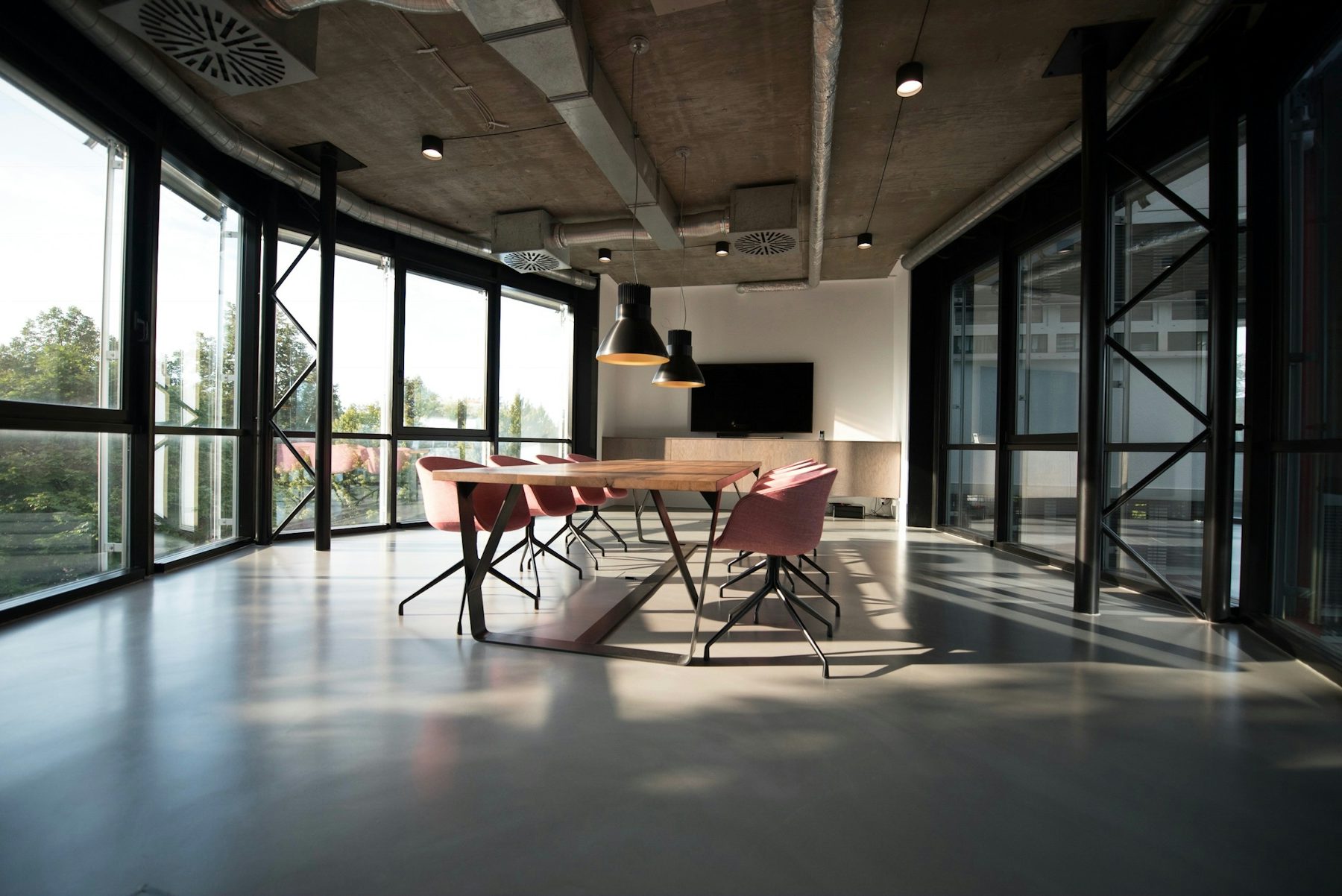 A boardroom prepared for a client meeting